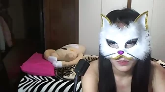 Sexy Asian masked as a cat teasing on webcamera